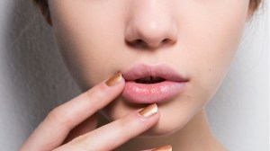 pretty model touching face