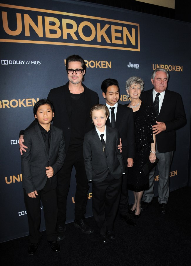Brad Pitt and three of his children suit up to attend the premiere of Angelina Jolie's "Unbroken."