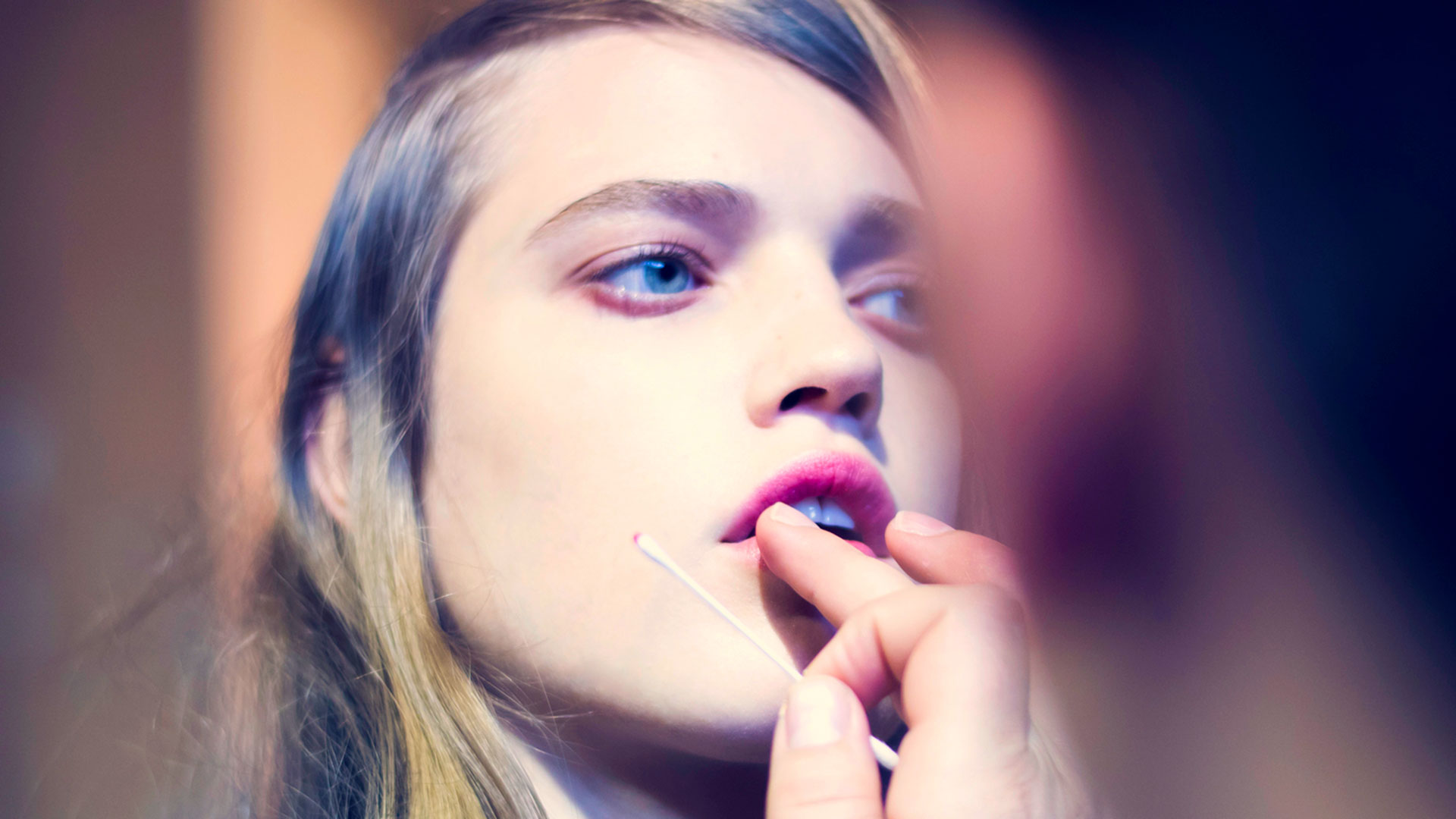 Woman Putting on Makeup