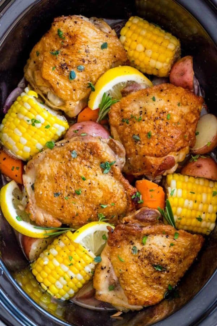 STYLECASTER | 17 Healthy Slow-Cooker Recipes to Add to Your Summer Arsenal | Chicken Thighs With Corn and Potatoes