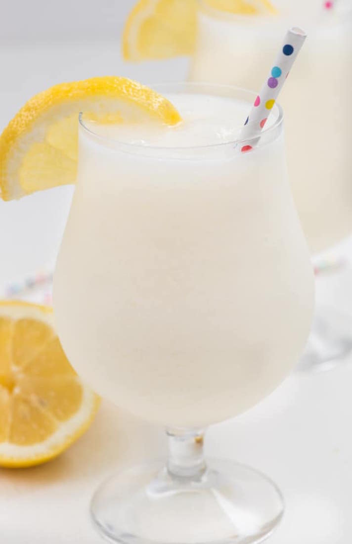 STYLECASTER | 17 Easy Blender Cocktails That Make Any Day Feel Like Vacation | Boozy Frozen Lemonade