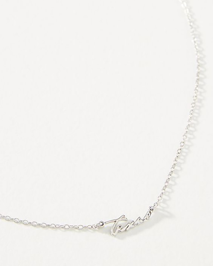 STYLECASTER | Word and Name Jewelry Is Having a Moment, Because Carrie Bradshaw Is a Forever Fashion Icon