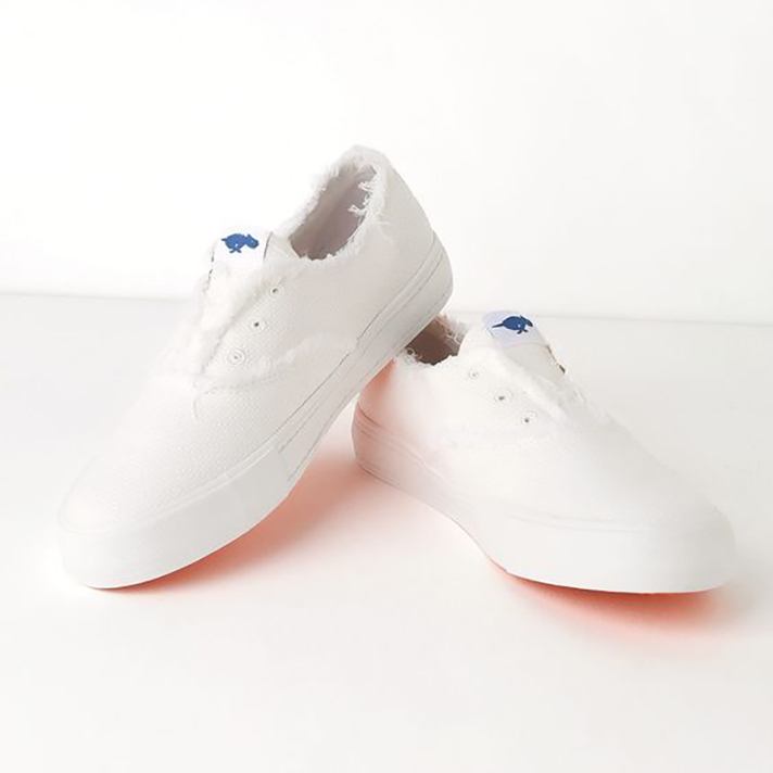 STYLECASTER | Dainty White Sneakers You Could Definitely Wear Under Your Bridal Gown