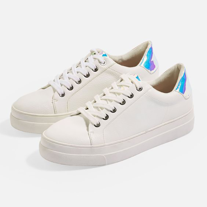 STYLECASTER | Dainty White Sneakers You Could Definitely Wear Under Your Bridal Gown