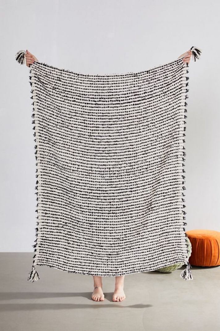 STYLECASTER | Lightweight Summer Blankets You Can Snuggle Up In Without Overheating