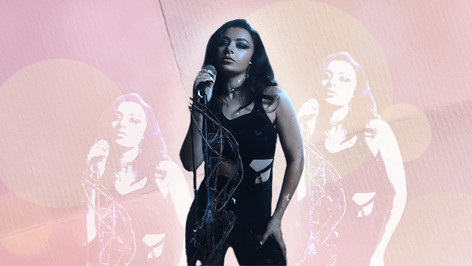 Charli XCX over a pink background
