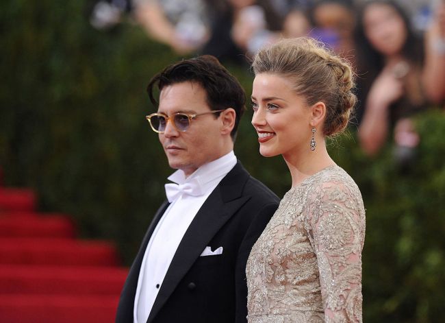 Johnny Depp and Amber Heard attend the 'Charles James: Beyond Fashion' Costume Institute Gala at the Metropolitan Museum of Art on May 5, 2014 in New York City.