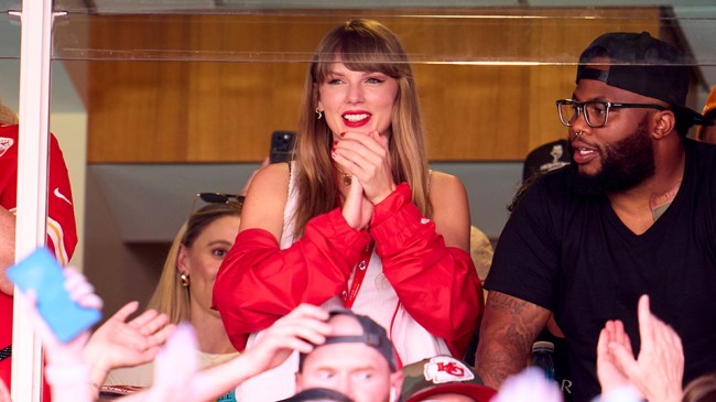 Taylor Swift cheers from a suite as the Kansas City Chiefs play the Chicago Bears at GEHA Field at Arrowhead Stadium on September 24, 2023 in Kansas City, Missouri.