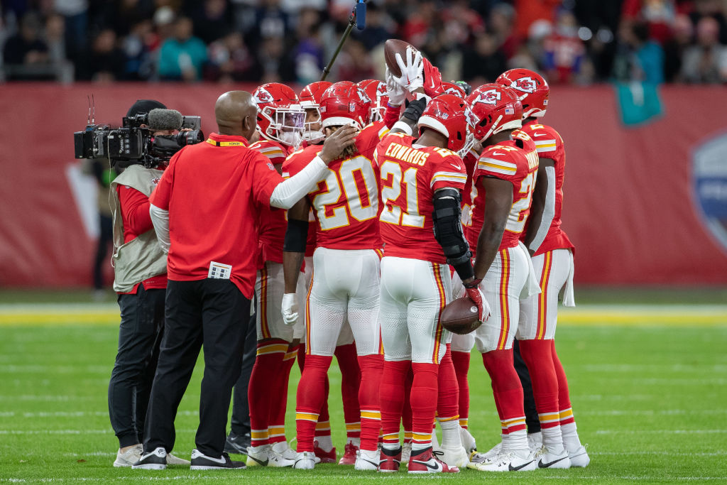 FRANKFURT AM MAIN, GERMANY - NOVEMBER 5: The team of Kansas City Chiefs form a circle during the NFL match between Miami Dolphins and Kansas City Chiefs at Deutsche Bank Park on November 5, 2023 in Frankfurt am Main, Germany. (Photo by Mario Hommes/DeFodi Images via Getty Images)