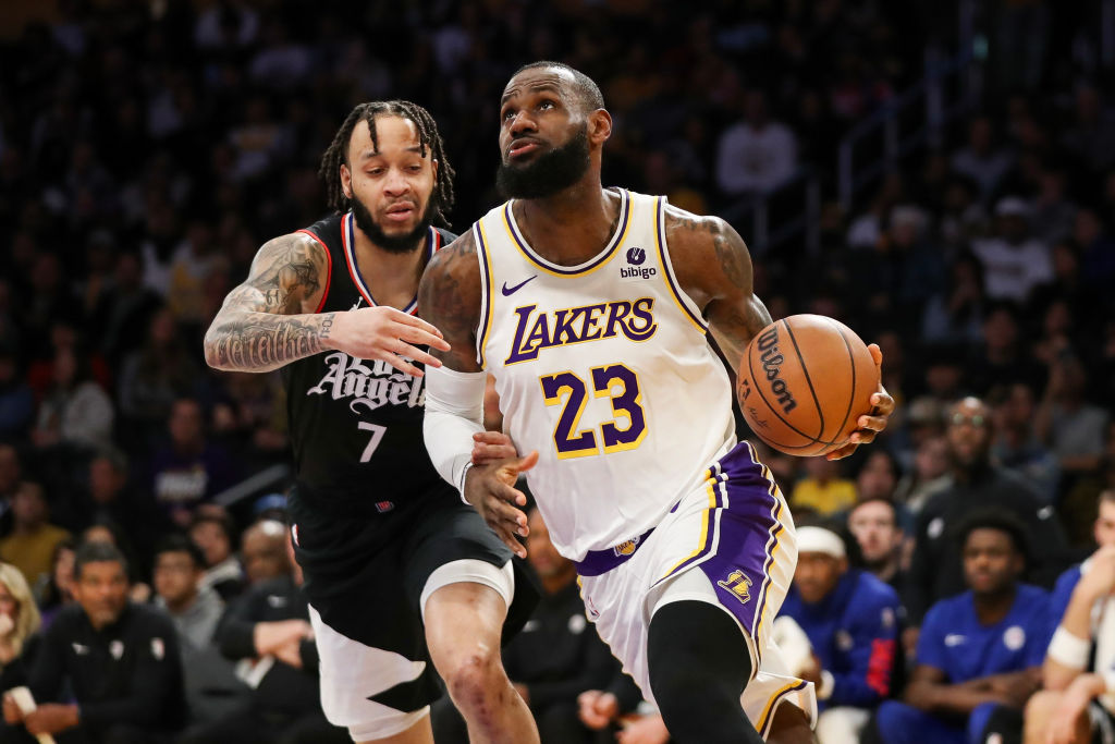 LOS ANGELES, CALIFORNIA - JANUARY 07: LeBron James #23 of the Los Angeles Lakers drives to the basket against Amir Coffey #7 of the LA Clippers in the second quarter at Crypto.com Arena on January 07, 2024 in Los Angeles, California.