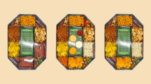 Three Super Bowl snack stadiums on a solid background