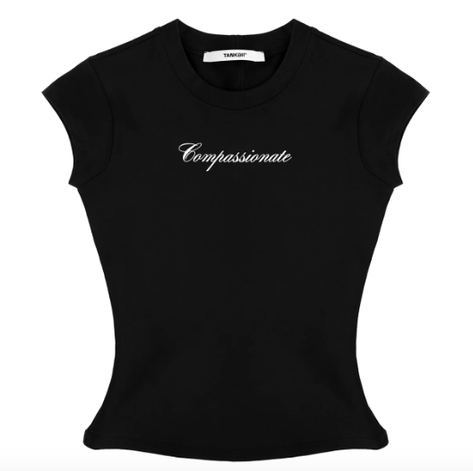 Tank Air Compassionate Baby Tee: a black baby tee with "compassionate" in cursive letters across the chest