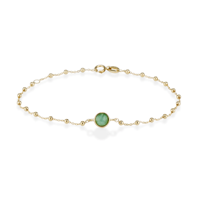 A gold-chain bracelet with a jade stone from Ashley Zhang Jewelry's Lunar New Year collection