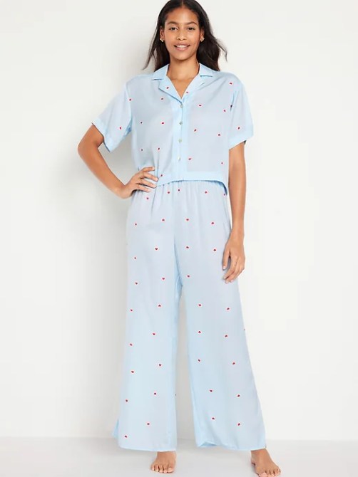A model wearing a light blue, heart-print PJ set from Old Navy