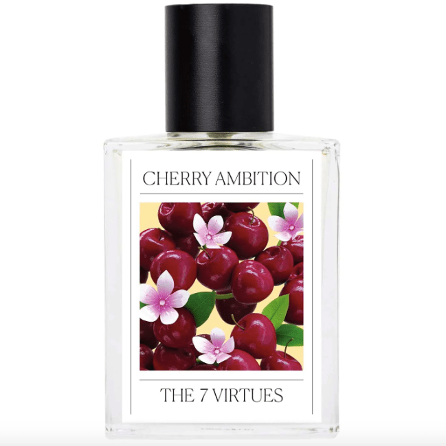 The 7 Virtues Cherry Ambition perfume in a glass bottle with cherries on the label.