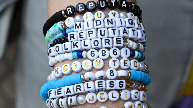 Swiftie wearing friendship braclets at Eras Tour