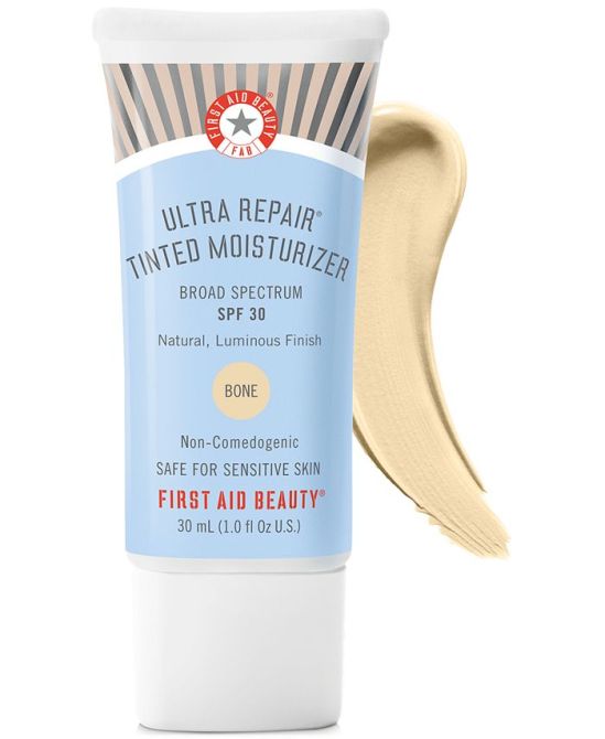 First Aid Beauty Ultra Repair Tinted Moisturizer in a blue bottle.