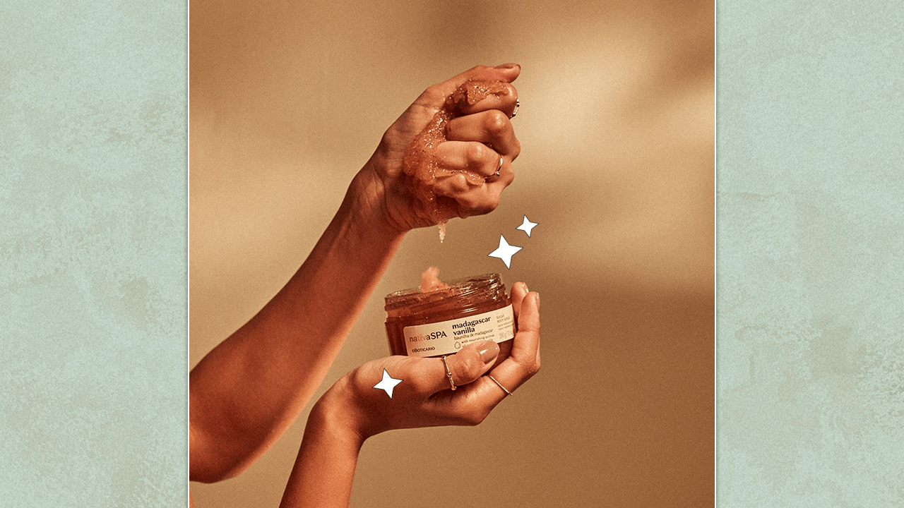 Model holding an open jar of Nativa SPA's Madagascar Vanilla Soothing Body Scrub.