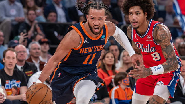 New York Knicks Jalen Brunson driving towards the basket with Kelly Oubre Jr. of the Philadelphia 76ers trailing during Game 2 of the NBA Playoffs first-round at Madison Square Garden in New York City, on April 22, 2024.
