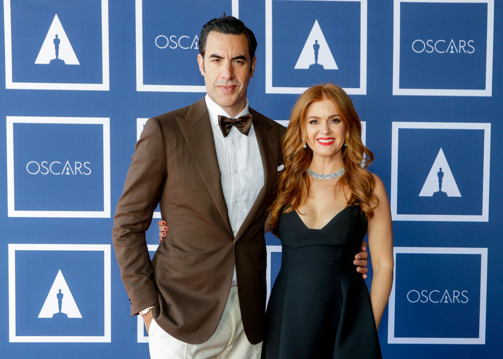 Sacha Baron Cohen (L) and Isla Fisher attend a screening of the Oscars on Monday, April 26, 2021 in Sydney, Australia
