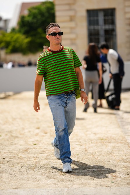 STYLECASTER | Men's outfit, striped T-shirt, jeans.
