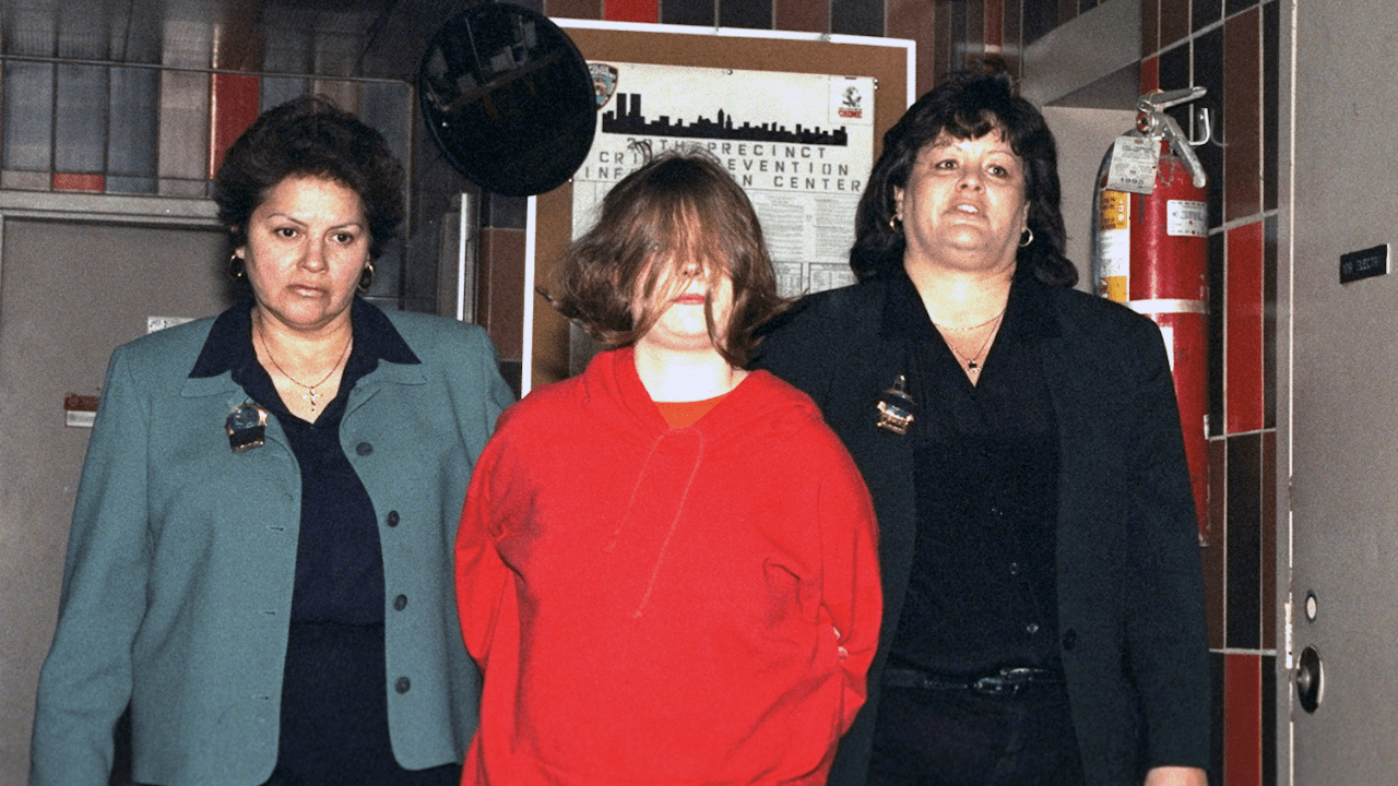 15 year old Daphne Abdela (c), a suspect in the Central Park murder of Michael McMorrow, in custody at the 20th precinc, 82nd St. and Columbus Ave. Ms. Abdela, along with her friend Christopher Vasquez, also 15, reportedly stabbed and slashed McMorrow before throwing his body in Central Park Lake.