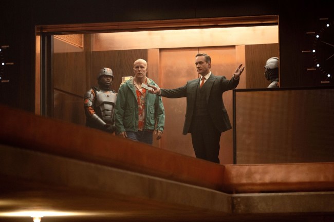 DEADPOOL & WOLVERINE, (aka DEADPOOL AND WOLVERINE, aka DEADPOOL 3), center, armorless, from left: Ryan Reynolds as Wade Wilson, Matthew Macfadyen as Mr. Paradox, 2024.