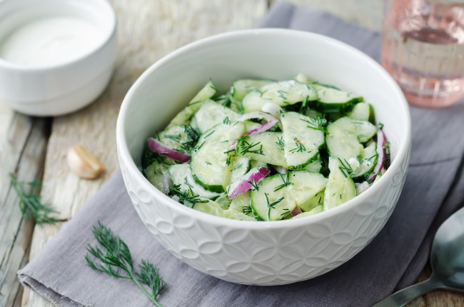 Creamy cucumber salad with dill and red onion