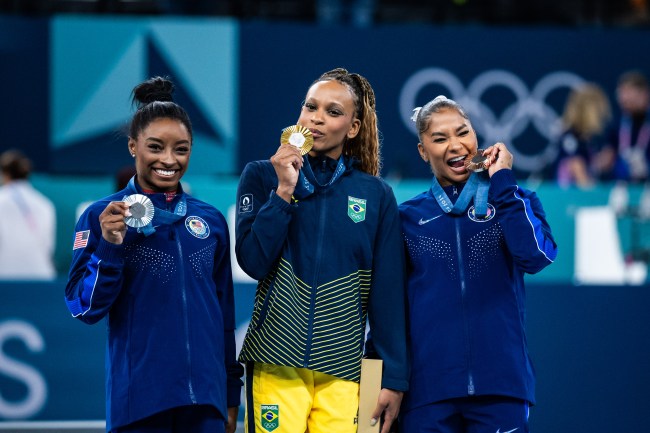 PARIS, FRANCE - AUGUST 5: Silver medalist Simone Biles of Team United States, Gold medalist Rebeca Andrade of Team Brazil and Bronze medalist Jordan Chiles of Team United States celebrate after the Artistic Gymnastics Women's Floor Exercise Final on day ten of the Olympic Games Paris 2024 at the Bercy Arena on August 5, 2024 in Paris, France