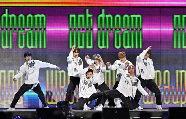 TOPSHOT - In this picture taken on June 18, 2022, South Korean K-Pop group NCT Dream perform during the 2022 Dream Concert at Jamsil stadium in Seoul. (Photo by Jung Yeon-je / AFP) (