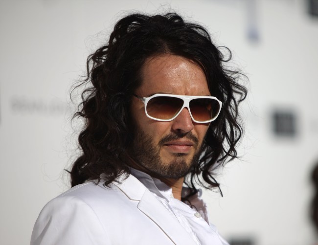 Actor Russell Brand arrives at the White Party hosted by Sean "Diddy" Combs and Ashton Kutcher to help raise awareness for Malaria No More held at a Private Residence on July 4, 2009 in Beverly Hills, California.