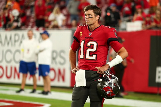 Tom Brady #12 of the Tampa Bay Buccaneers stands on the field prior to an NFL football game against the New Orleans Saints at Raymond James Stadium on December 5, 2022 in Tampa, Florida. 