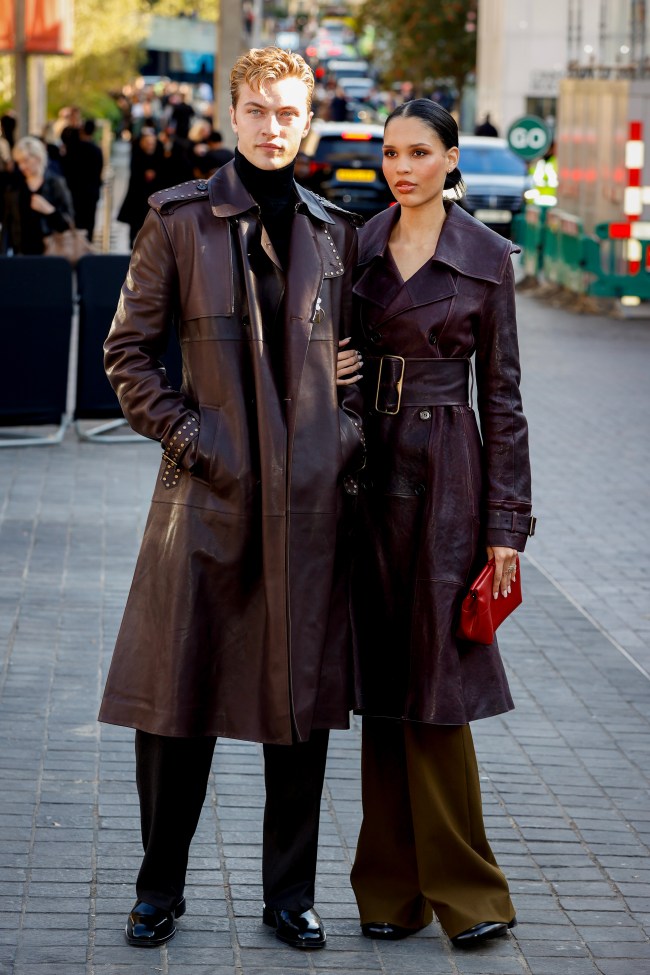 Lucky Blue Smith and Nara Smith attend the Burberry show during London Fashion Week September 2024 at the National Theatre on September 16, 2024 in London, England. 