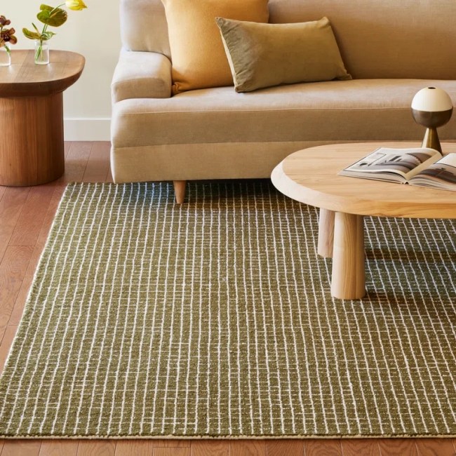 A green and white rug