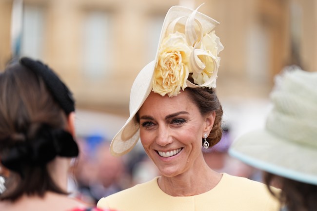 LONDON, ENGLAND - MAY 20: Catherine, Princess of Wales greets guests during a Royal Garden Party at Buckingham Palace on May 20, 2025 in London, England