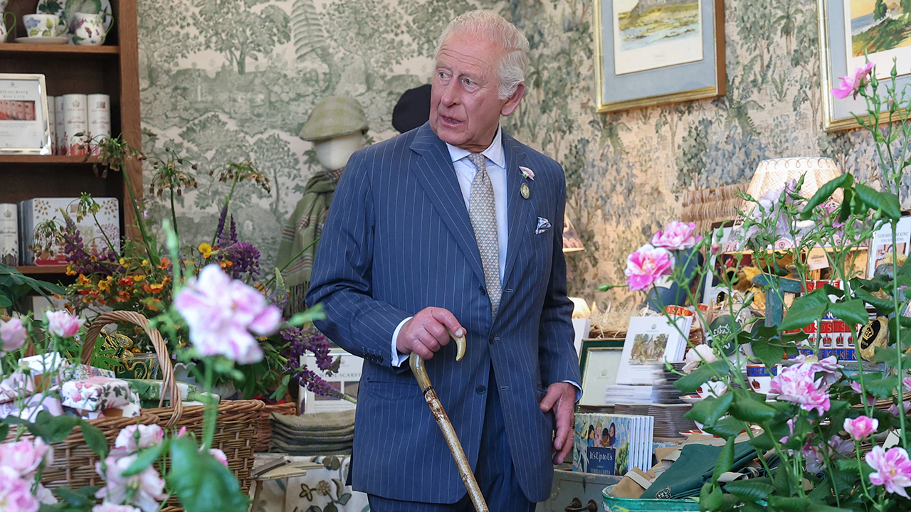 LONDON, ENGLAND - MAY 20: King Charles III, patron of the Royal Horticultural Society, looks around the displays at the Highgrove Shop during a visit to the RHS Chelsea Flower Show at Royal Hospital Chelsea on May 20, 2025 in London, England.
