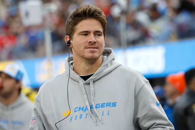 INGLEWOOD, CALIFORNIA - JANUARY 07: Justin Herbert #10 of the Los Angeles Chargers looks on from the sidelines during a game against the Kansas City Chiefs at SoFi Stadium on January 07, 2024 in Inglewood, California.