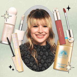 A collage with a close-up photo of Alysa Liu at the 2026 Vanity Fair Oscar Party surrounded by beauty products she uses (Rare Beauty liquid highlighter, Tarte mascara, Rare Beauty lip oil, and Anessa sunscreen).